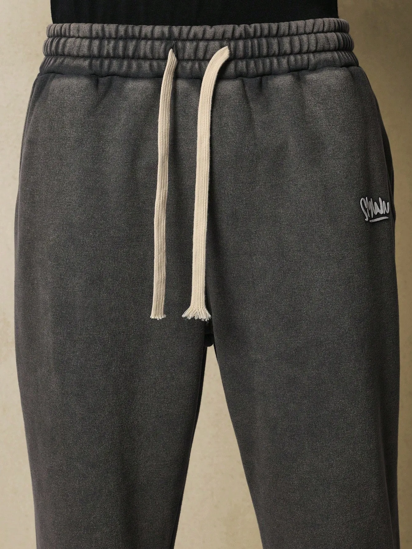 Washed Pull On Flare Fit Sweatpants With Small Graphic Print