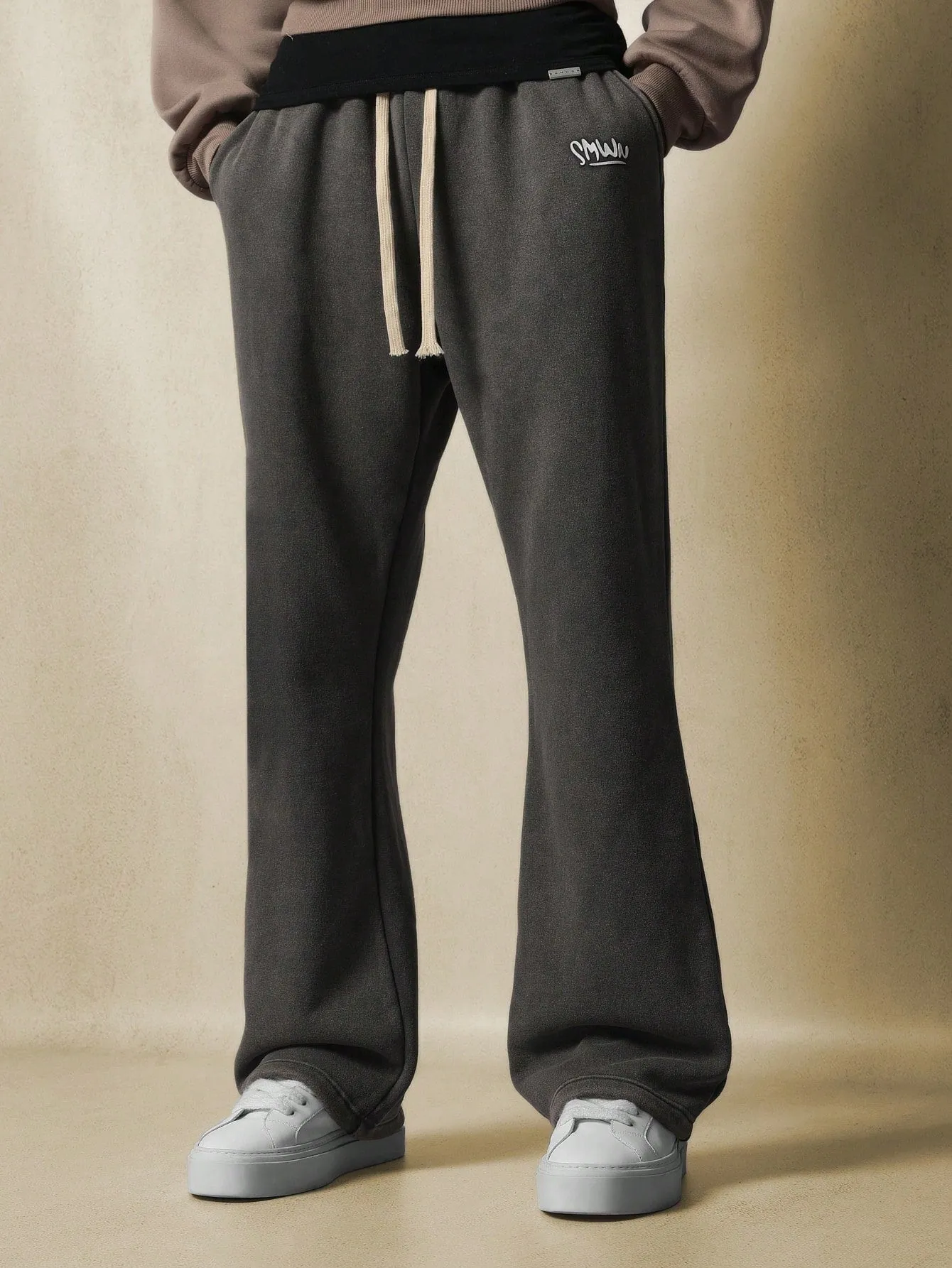 Washed Pull On Flare Fit Sweatpants With Small Graphic Print